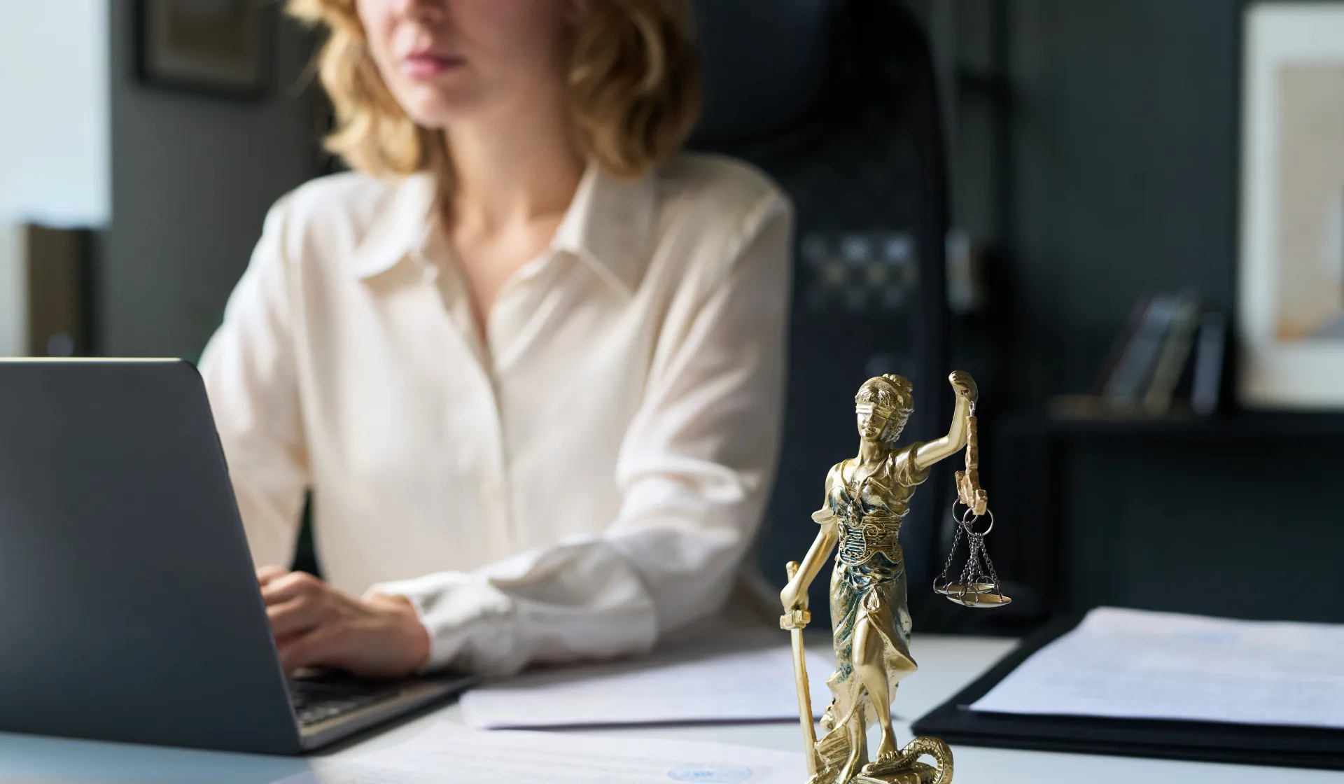 LeadGulls PPC specialists reviewing a law firm Google Ads campaign dashboard showing consultation inquiry volume, cost per case, and keyword performance for a legal services client